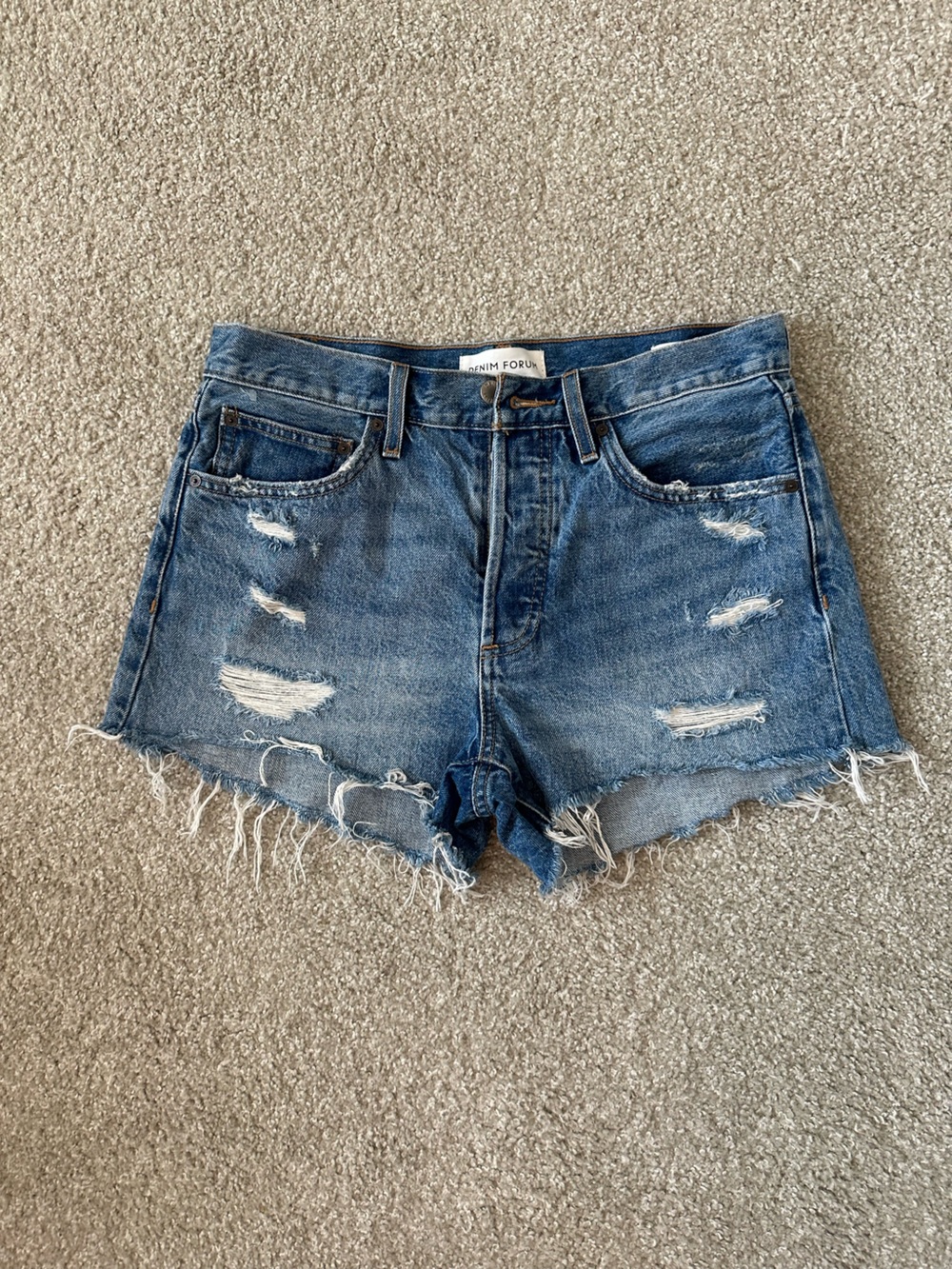 Aritzia - High- Rise Distressed Denim Shorts in Medium Blue